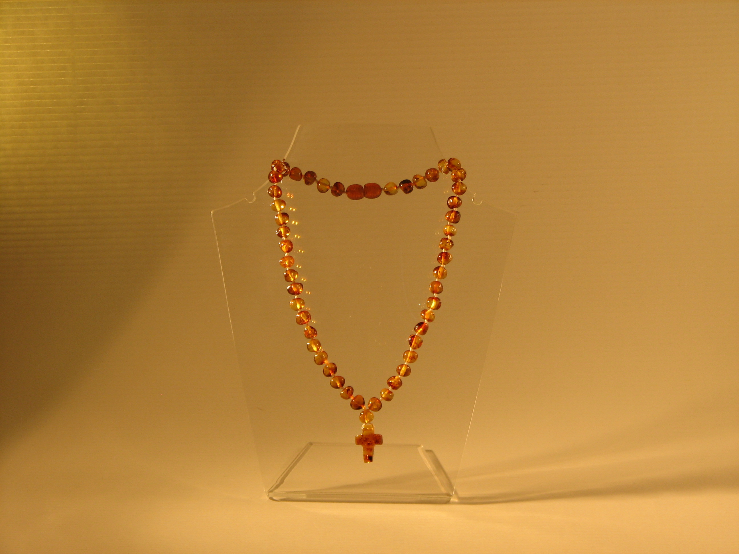 Amber Teething Necklaces Baroque with Cross Cognac