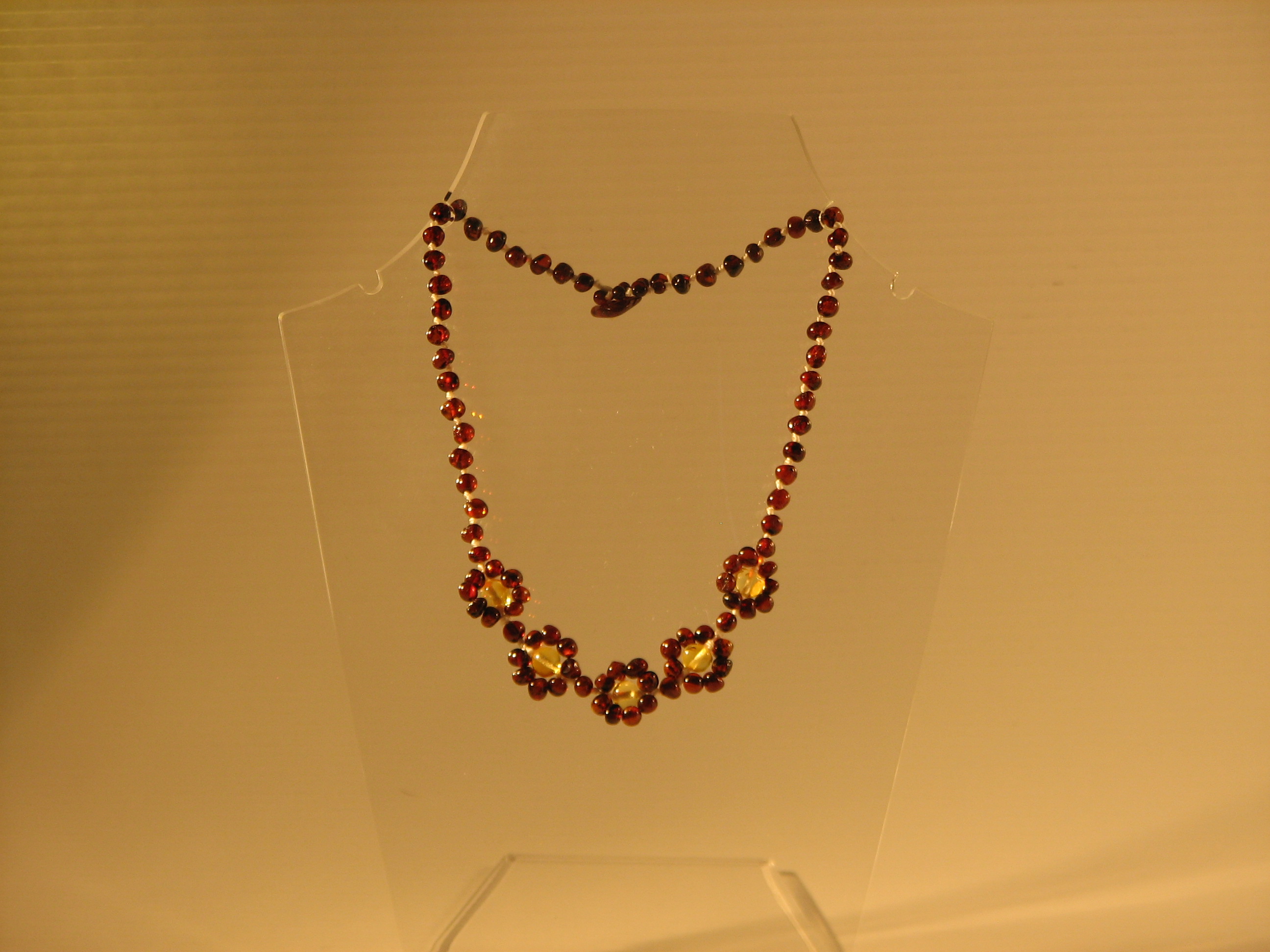 Amber Teething Necklaces Baroque flower style Cognac